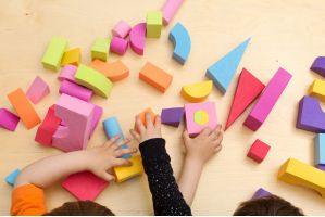 children-sharing-and-playing-with-toys